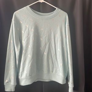 Woman’s unicorn sweater